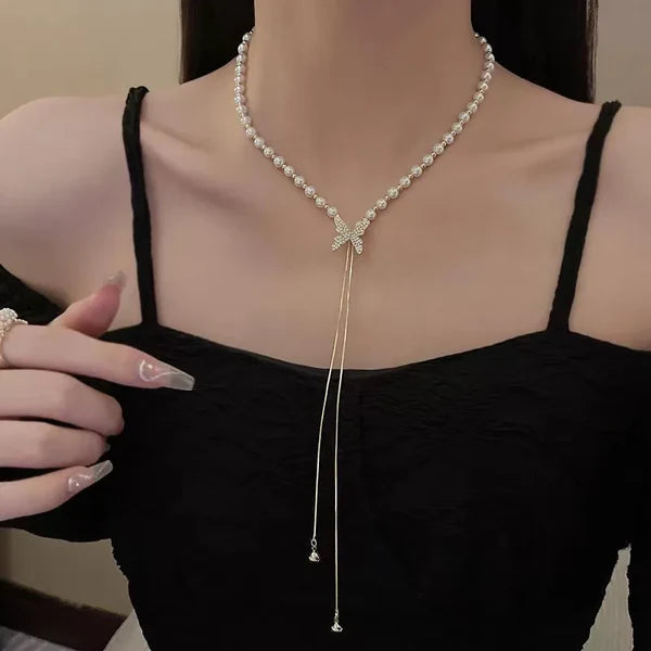 Collar de Perlas con Dije Mariposa